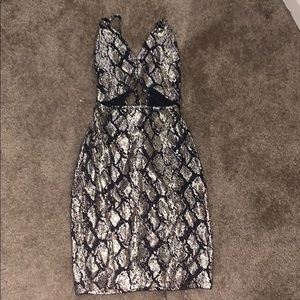 black and silver cut out dress